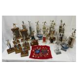 27 trophies and a bunch of pins