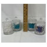 Four glass crystal jars with lids 5 inches tall