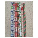 7 Sealed Rolls of Wrapping Paper