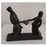 The Wedding Dance Metal Sculpture has chip