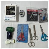 Scissors, laser pens, pedometer, stapler and clip