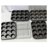 4 muffin pans and cooling racks.