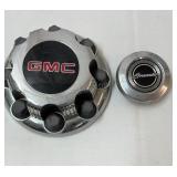 GMC HD truck center cap, Ford Granada gas cap.