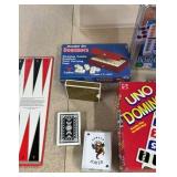 Playing cards and domino games as well as
