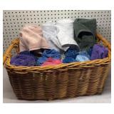 Woven Wicker Basket with Rolled Towels