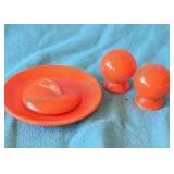 Orange Fiesta ware dishes. All pieces pictured.