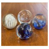 1 crystal paper weights & 3 glass Paperweights &