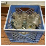 Milk Crate of Glass Insulators