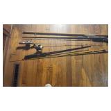 Group of Assorted Fishing Poles in News Paper