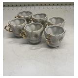 Occupied porcelain teacups