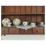 Chipped, Mismatched Tea Cup and Saucers
