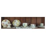 Chipped, Mismatched Tea Cup and Saucers