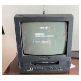 SYLVANIA 13" CRT/TV VIDEO PLAYER. Note VHS tape