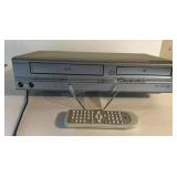 EMERSON VHS DVD PLAYER WITH REMOTE POWERS ON