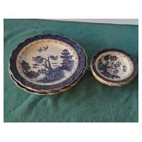 Vintage blue Asian pattern dishes with gold trim.