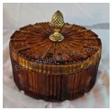 Vintage amber glass covered candy dish with brass