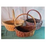 Wicker baskets with hoop handles.
