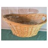Wicker laundry basket. 10x24x18.