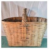 Large wicker basket with curved handle. 19x25x18