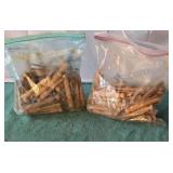 Vintage clothespins in two bags.