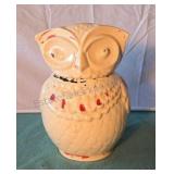 Cookie jar. Ivory with red and black hand painted