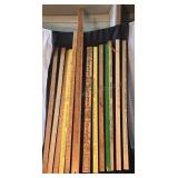 A display of yard sticks. Also one 38in. and one