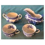 Assorted blue Asian pattern cups, creamers and