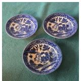 Blue Asian pattern saucers. Marked "Made in