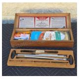 Outreach Shotgun cleaning kit in wood box.