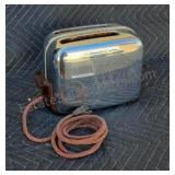 Mid-century Toastmaster toaster. Chipped handle.