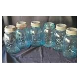 Ball canning jars, blue. All but one has a zinc
