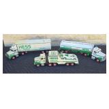 Vintage Hess Plaster toy trucks.