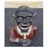 vintage-style cast iron mechanical coin bank that