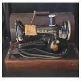 Vintage Singer portable sewing machine in wood