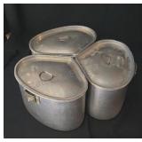 Vintage aluminum cooking pots. Designed to save