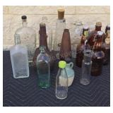Assorted glass bottles.