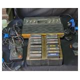 Vintage Atari gaming system with 3 joysticks and