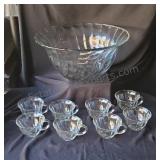 Glass punch bowl and eight cups.