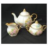 Vintage teapot creamer and sugar bowl. Family