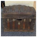 Antique humpback steamer trunk. Alligator hide.