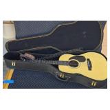 Lotus 6 string acoustic guitar with case. Model