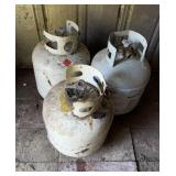 Empty & 1 Partial Full Propane Tanks