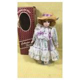 14" collector series porcelain doll with stand