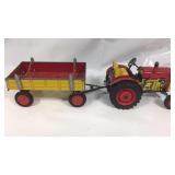 Vintage metal tractor with metal wagon/trailer