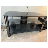 Glass media stand