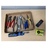 Assorted tools, pliers, crescent wrench, vise grip