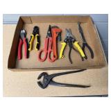 Wire cutters, pipe wrench, tin snips