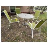 Round patio table, chairs (4)