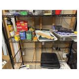 Shelf of paint supplies, rollers, consumables
