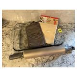 Baking dish, rolling pin, cheese cloth, potholder